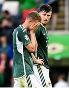 19 June 2023; George Saville, left, and Paddy McNair of Northern Ireland after their side's defeat in the UEFA EURO 2024 Championship Qualifier match between Northern Ireland and Kazakhstan at National Stadium at Windsor Park in Belfast. Photo by Ramsey Cardy/Sportsfile
