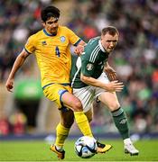 19 June 2023; Shayne Lavery of Northern Ireland in action against Marat Bystrov of Kazakhstan during the UEFA EURO 2024 Championship Qualifier match between Northern Ireland and Kazakhstan at National Stadium at Windsor Park in Belfast. Photo by Ramsey Cardy/Sportsfile
