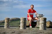 20 June 2023; Conor Glass of Derry poses for a portrait with the Sam Maguire cup at the 2023 GAA Football All-Ireland Series national launch in Howth, Dublin. Photo by Brendan Moran/Sportsfile