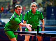 20 June 2023; Team Ireland's Sean Sammon, a member of Castlebar Special Olympics Club, from Castlebar, Mayo, returns a serve with Team Ireland's Fiona Brady, a member of Navan Arch Special Olympics Club, from Navan, Meath, during the Mixed Doubles Table Tennis Qualifiers on day four of the World Special Olympic Games 2023 at the Messe Berlin in Berlin, Germany. Photo by Ray McManus/Sportsfile