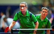 20 June 2023; Team Ireland's Fiona Brady, a member of Navan Arch Special Olympics Club, from Navan, Meath, returns a serve supported by Team Ireland's Sean Sammon, a member of Castlebar Special Olympics Club, from Castlebar, Mayo, during the Mixed Doubles Table Tennis Qualifiers on day four of the World Special Olympic Games 2023 at the Messe Berlin in Berlin, Germany. Photo by Ray McManus/Sportsfile