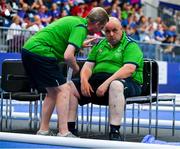 20 June 2023; Bocce Head Coach, Michael Spelman, talking to Team Ireland's Seamus O'Sullivan, a member of COPE Foundation Cork, from Macroom, Cork, during the Bocce qualifiers on day four of the World Special Olympic Games 2023 at the Messe Berlin in Berlin, Germany. Photo by Ray McManus/Sportsfile