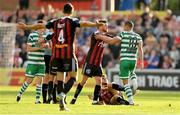 23 June 2023; Adam McDonnell of Bohemians and Graham Burke of Shamrock Rovers tussle during the SSE Airtricity Men's Premier Division match between Bohemians and Shamrock Rovers at Dalymount Park in Dublin. Photo by Seb Daly/Sportsfile