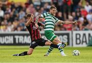 23 June 2023; Lee Grace of Shamrock Rovers in action against Adam McDonnell during the SSE Airtricity Men's Premier Division match between Bohemians and Shamrock Rovers at Dalymount Park in Dublin. Photo by Seb Daly/Sportsfile