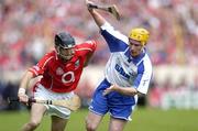 27 June 2004; Ben O'Connor, Cork, in action against Eoin Murphy, Waterford. Guinness Munster Senior Hurling Championship Final, Cork v Waterford, Semple Stadium, Thurles, Co. Tipperary. Picture credit; Ray McManus / SPORTSFILE