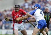 27 June 2004; Brian Corcoran, Cork, in action against Declan Prendergasy, Waterford. Guinness Munster Senior Hurling Championship Final, Cork v Waterford, Semple Stadium, Thurles, Co. Tipperary. Picture credit; Ray McManus / SPORTSFILE