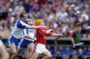 27 June 2004; Joe Deane, Cork, in action against Eoin Kelly, Waterford. Guinness Munster Senior Hurling Championship Final, Cork v Waterford, Semple Stadium, Thurles, Co. Tipperary. Picture credit; Ray McManus / SPORTSFILE