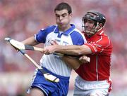 27 June 2004; Brian Phelan, Waterford, in action against Brian Corcoran, Cork. Guinness Munster Senior Hurling Championship Final, Cork v Waterford, Semple Stadium, Thurles, Co. Tipperary. Picture credit; Ray McManus / SPORTSFILE