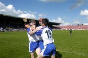 27 June 2004; Paul O'Brien, 19, Seamus Prendergast (red helmet) and Jack Kennedy, Waterford, celebrate victory over Cork. Guinness Munster Senior Hurling Championship Final, Cork v Waterford, Semple Stadium, Thurles, Co. Tipperary. Picture credit; Ray McManus / SPORTSFILE