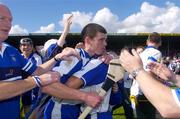 27 June 2004; Brian Phelan, Waterford, celebrates with team-mate Eoin McGrath .Guinness Munster Senior Hurling Championship Final, Cork v Waterford, Semple Stadium, Thurles, Co. Tipperary. Picture credit; Ray McManus / SPORTSFILE