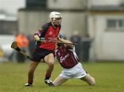 26 June 2004; Gabriel Clarke, Down, in action against Damien Hayes, Galway. Guinness Senior Hurling Championship Qualifier, Round 1, Down v Galway, McKenna Park, Ballycran, Co. Down. Picture credit; Brendan Moran / SPORTSFILE