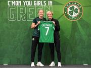 29 June 2023; Diane Caldwell is presented with her jersey by Republic of Ireland manager Vera Pauw during a Republic of Ireland FIFA Women's World Cup 2023 squad announcement event at O'Reilly Hall in UCD, Dublin. Photo by Stephen McCarthy/Sportsfile