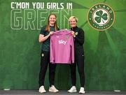 29 June 2023; Goalkeeper Courtney Brosnan  is presented with her jersey by Republic of Ireland manager Vera Pauw during a Republic of Ireland FIFA Women's World Cup 2023 squad announcement event at O'Reilly Hall in UCD, Dublin. Photo by Stephen McCarthy/Sportsfile