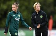 29 June 2023; Republic of Ireland manager Vera Pauw, right, and Sinead Farrelly during a Republic of Ireland women training session at UCD Bowl in Dublin. Photo by Stephen McCarthy/Sportsfile