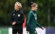 29 June 2023; Republic of Ireland manager Vera Pauw, left, and Sinead Farrelly during a Republic of Ireland women training session at UCD Bowl in Dublin. Photo by Stephen McCarthy/Sportsfile