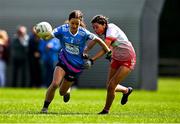 1 July 2023; Ava Mullins of Naomh Mhuire is tackled by Doireann Barry of Inch Rovers during the LGFA Division 1 match between Inch Rovers, Cork, and Naomh Mhuire, Galway, at the John West Féile Peile na nÓg National Gaelic football and ladies’ football Finals at the Connacht GAA Centre of Excellence in Bekan, Mayo. Eighty-four club sides took part in the national finals across 10 venues in Connacht. Sponsored for the eighth time by John West, it is one of the biggest underage sporting events on the continent. Photo by Ben McShane/Sportsfile