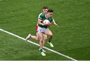 1 July 2023; Paudie Clifford of Kerry is tackled by Conor Meyler of Tyrone during the GAA Football All-Ireland Senior Championship quarter-final match between Kerry and Tyrone at Croke Park in Dublin. Photo by Brendan Moran/Sportsfile