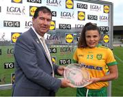 1 July 2023; Niamh Ní Eigeartaigh of Donegal receives the Player of the Match award from Uachtarán LGFA Mícheál Naughton following the TG4 Ladies Football All-Ireland Senior Championship match between Meath and Donegal at Páirc Tailteann in Navan, Meath. Photo by Michael P Ryan/Sportsfile