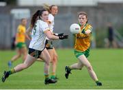 1 July 2023; Cáit O'Dubhda of Donegal in action against Meadhbh Byrne of Meath during the TG4 Ladies Football All-Ireland Senior Championship match between Meath and Donegal at Páirc Tailteann in Navan, Meath. Photo by Michael P Ryan/Sportsfile