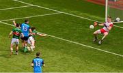 2 July 2023; Colm Basquel of Dublin scores his side's first goal despite the best efforts of Jack Coyne and Pádraig O’Hora of Mayo and goalkeeper Colm Reape during the GAA Football All-Ireland Senior Championship quarter-final match between Dublin and Mayo at Croke Park in Dublin. Photo by Brendan Moran/Sportsfile