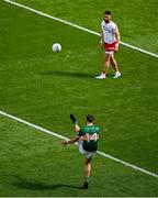 1 July 2023; David Clifford of Kerry scores a free kick as Pádraig Hampsey of Tyrone looks on during the GAA Football All-Ireland Senior Championship quarter-final match between Kerry and Tyrone at Croke Park in Dublin. Photo by Brendan Moran/Sportsfile