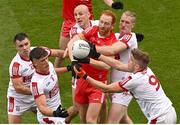 2 July 2023; Conor Glass of Derry competes with Cork players, from left, Colm O'Callaghan, Sean Powter, Brian O'Driscoll, Ruairi Deane and Ian Maguire for a dropping ball during the GAA Football All-Ireland Senior Championship quarter-final match between Derry and Cork at Croke Park in Dublin. Photo by Brendan Moran/Sportsfile