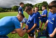 5 July 2023; Leinster player Jordan Larmour signs autographs during a Bank of Ireland Leinster Rugby Summer Camp at Stillorgan-Rathfarnham RFC in Dublin. Photo by Harry Murphy/Sportsfile