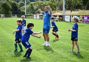 5 July 2023; Leinster player Jordan Larmour celebrates during a Bank of Ireland Leinster Rugby Summer Camp at Stillorgan-Rathfarnham RFC in Dublin. Photo by Harry Murphy/Sportsfile