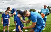 5 July 2023; Leinster player Jordan Larmour signs autographs during a Bank of Ireland Leinster Rugby Summer Camp at Stillorgan-Rathfarnham RFC in Dublin. Photo by Harry Murphy/Sportsfile