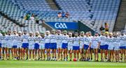 8 July 2023; The Antrim and Tipperary teams stand together wearing United for Equality tshirts before the All-Ireland Senior Camogie Championship quarter-final match between Tipperary and Antrim at Croke Park in Dublin. Photo by Brendan Moran/Sportsfile