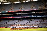 8 July 2023; The Antrim and Tipperary teams stand together wearing United for Equality tshirts before the All-Ireland Senior Camogie Championship quarter-final match between Tipperary and Antrim at Croke Park in Dublin. Photo by Ramsey Cardy/Sportsfile