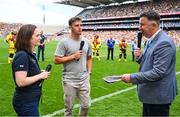 9 July 2023; Volunteer Lifeboat crew from around Ireland promote the RNLI’s drowning prevention partnership with the GAA on the pitch at the All-Ireland Senior Hurling semi-final in Croke Park, Dublin. The charity is sharing water safety advice with clubs and supporters throughout the country. Pictured are Lisa Hollingum of the RNLI, Waterford hurler Dessie Hutchinson, centre, and MC Paul Collins. Photo by Brendan Moran/Sportsfile