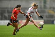 15 July 2023; Daire Kiely of Cork in action against Emily Druse of Armagh during the TG4 Ladies Football All-Ireland Senior Championship quarter-final match between Armagh and Cork at BOX-IT Athletic Grounds in Armagh. Photo by Ben McShane/Sportsfile