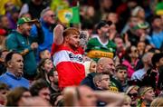 16 July 2023; A nervous Derry supporter looks on in the last minutes of the GAA Football All-Ireland Senior Championship Semi-Final match between Derry and Kerry at Croke Park in Dublin. Photo by Brendan Moran/Sportsfile