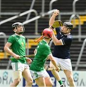 16 July 2023; Maurice McKenna of Monaghan Harps assisted by Conor Duffy and James Brady takes the ball in the air during the 2023 CúChulainn Hurling League Division 3 Final match between Carrickmacross, Monaghan, and Monaghan Harps, Monaghan, at Kingspan Breffni Park in Cavan. Photo by Oliver McVeigh/Sportsfile