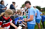 17 July 2023; Brian Deeny signs autographs for supporters after a Leinster rugby squad training and gym session at Wicklow RFC in Wicklow. Photo by Brendan Moran/Sportsfile