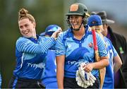 19 July 2023; Typhoons players Mary Waldron, left, and Georgia Atkinson celebrate after their sides victory in the Evoke Super Series 2023 match between Typhoons and Scorchers at Pembroke Cricket Club in Dublin. Photo by Sam Barnes/Sportsfile