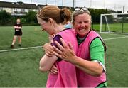 20 July 2023; Coach Tina McLoughlin, right, with participants during the Cadbury Kick Fit Programme at Baldoyle United in Dublin. Photo by Sam Barnes/Sportsfile