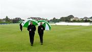 23 July 2023; Umpires Mark Hawthorne, left, and Paul Reynolds before the Certa Women’s One Day International Challenge match between Ireland and Australia at Castle Avenue Cricket Ground in Dublin. Photo by Seb Daly/Sportsfile