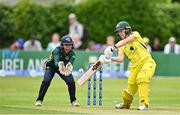 25 July 2023; Georgia Wareham of Australia bats watch by Ireland wicketkeeper Amy Hunter during match two of the Certa Women’s One Day International Challenge between Ireland and Australia at Castle Avenue in Dublin. Photo by Sam Barnes/Sportsfile