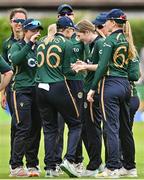 25 July 2023; Georgina Dempsey of Ireland, centre, celebrates with team-mates after bowling  Ashleigh Gardner of Australia during match two of the Certa Women’s One Day International Challenge between Ireland and Australia at Castle Avenue in Dublin. Photo by Sam Barnes/Sportsfile