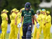 25 July 2023; Orla Prendergast of Ireland leaves the field after being caught out by Alyssa Healy of Australia  during match two of the Certa Women’s One Day International Challenge between Ireland and Australia at Castle Avenue in Dublin. Photo by Sam Barnes/Sportsfile