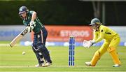 25 July 2023; Amy Hunter of Ireland bats watched by Australia wicketkeeper Alyssa Healy during match two of the Certa Women’s One Day International Challenge between Ireland and Australia at Castle Avenue in Dublin. Photo by Sam Barnes/Sportsfile