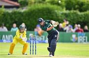 25 July 2023; Arlene Kelly of Ireland hits a four during match two of the Certa Women’s One Day International Challenge between Ireland and Australia at Castle Avenue in Dublin. Photo by Sam Barnes/Sportsfile