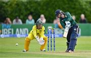 25 July 2023; Cara Murray of Ireland bats as Australia wicketkeeper Alyssa Healy watches on during match two of the Certa Women’s One Day International Challenge between Ireland and Australia at Castle Avenue in Dublin. Photo by Sam Barnes/Sportsfile