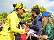 25 July 2023; Alana King of Australia signs an autograph for a supporter after match two of the Certa Women’s One Day International Challenge between Ireland and Australia at Castle Avenue in Dublin. Photo by Sam Barnes/Sportsfile