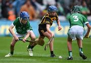 23 July 2023; Paddy Ketterick, Brackloon NS, Westport, Mayo, representing Limerick, left, in action against Peadar Lambe, Scoil Mhuire Marino, Droim Conrach, Ath Cliath, representing Kilkenny, during the INTO Cumann na mBunscol GAA Respect Exhibition Go Games at the GAA Hurling All-Ireland Senior Championship final match between Kilkenny and Limerick at Croke Park in Dublin. Photo by Piaras Ó Mídheach/Sportsfile