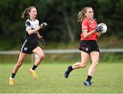 27 July 2023; Daphne Ballard of Canada in action against Johanna Duviver of Brittany during day four of the FRS Recruitment GAA World Games 2023 at the Owenbeg Centre of Excellence in Dungiven, Derry. Photo by Piaras Ó Mídheach/Sportsfile