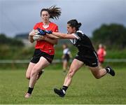 27 July 2023; Ciara Murphy of Canada in action against Elena Benoist of Brittany during day four of the FRS Recruitment GAA World Games 2023 at the Owenbeg Centre of Excellence in Dungiven, Derry. Photo by Piaras Ó Mídheach/Sportsfile