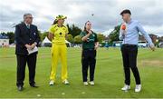 28 July 2023; Ireland captain Laura Delany, second from right, tosses the coin alongside Australia captain Tahlia McGrath, match referee Phil Thompson, left, and HBV Studios preseter Sean Hussey before match three of the Certa Women’s One Day International Challenge series between Ireland and Australia at Castle Avenue Cricket Ground in Dublin. Photo by Seb Daly/Sportsfile